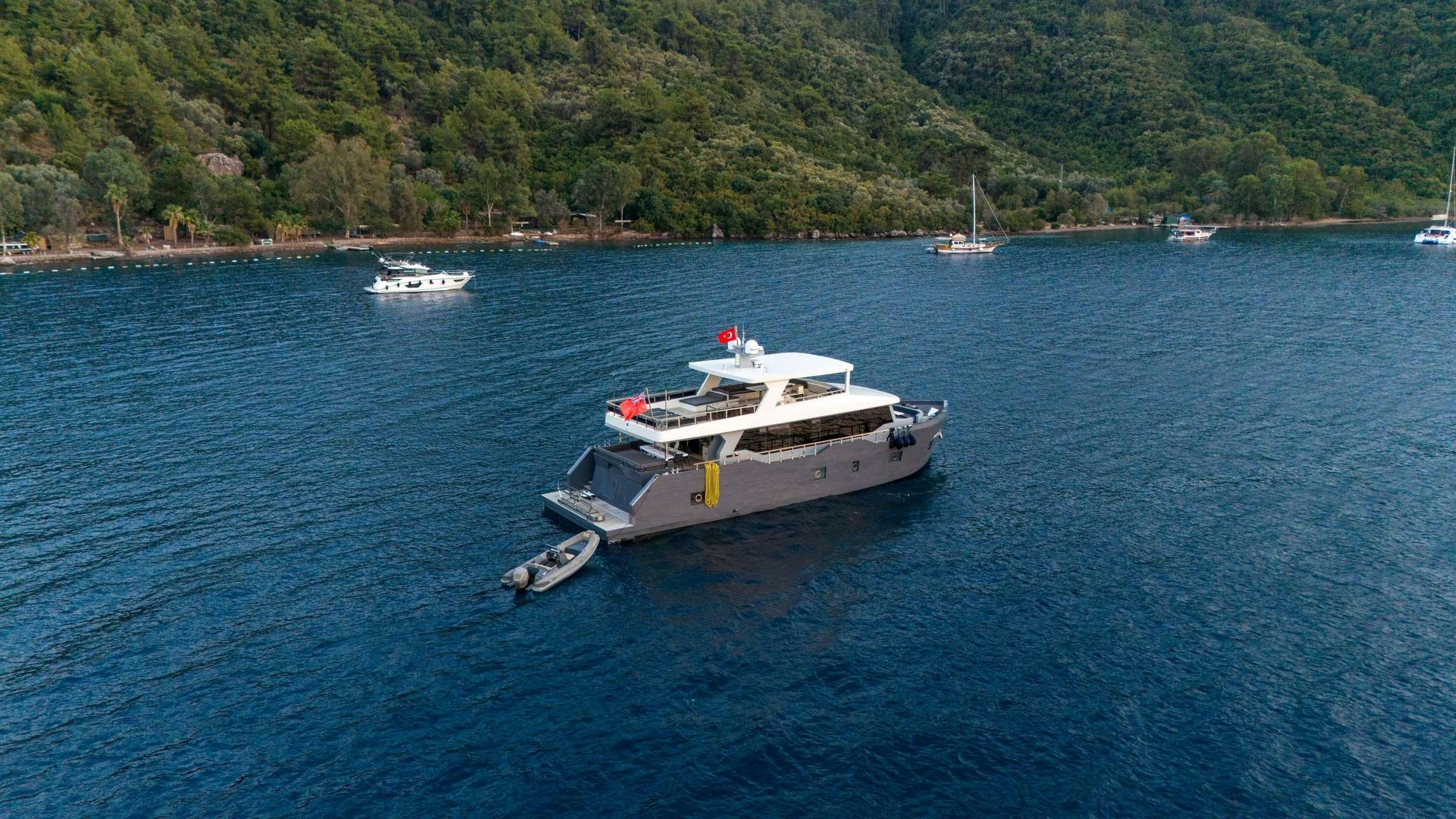 a boat on the water aboard IMPACT Yacht for Charter
