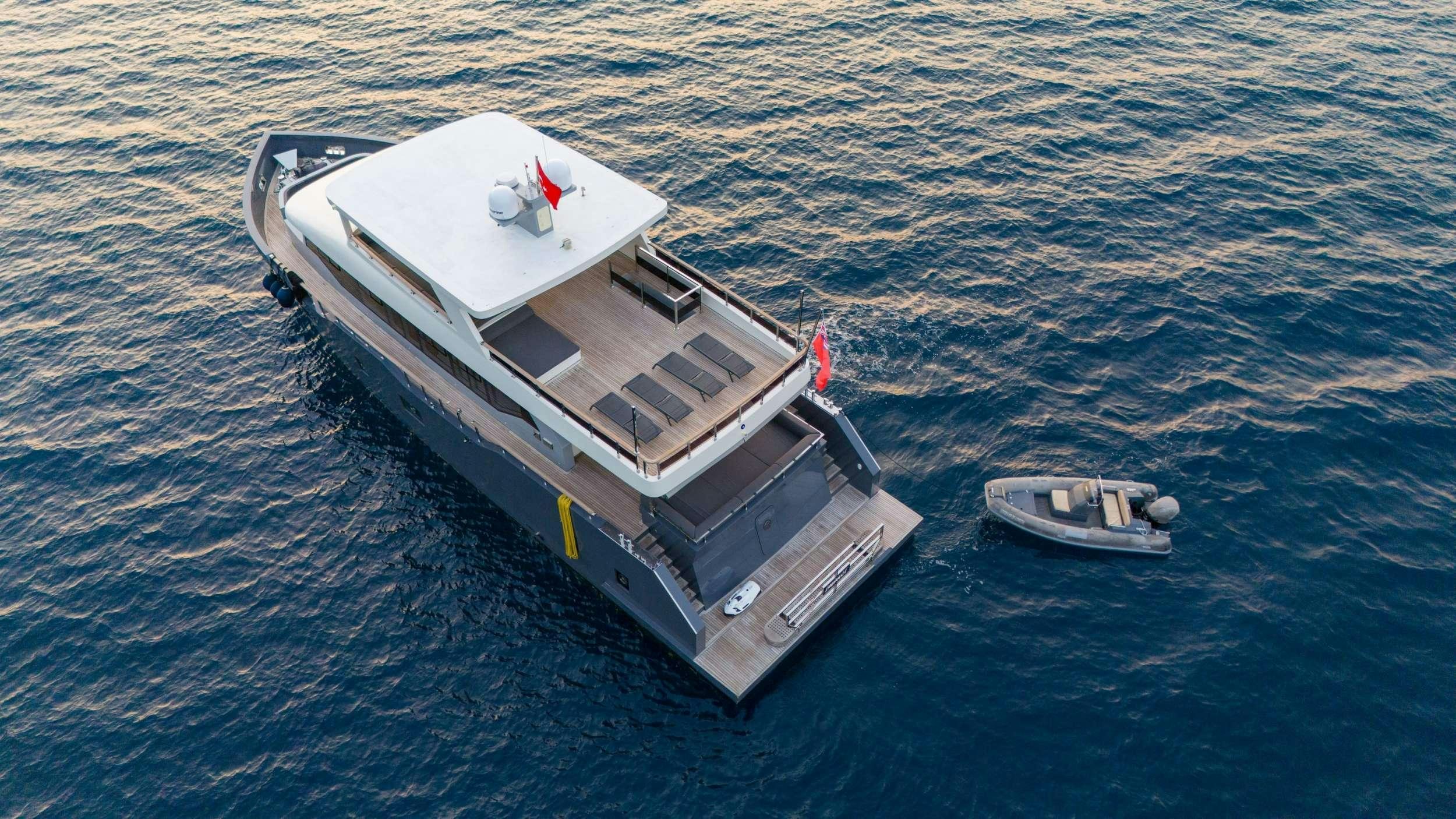 a boat in the water aboard IMPACT Yacht for Charter