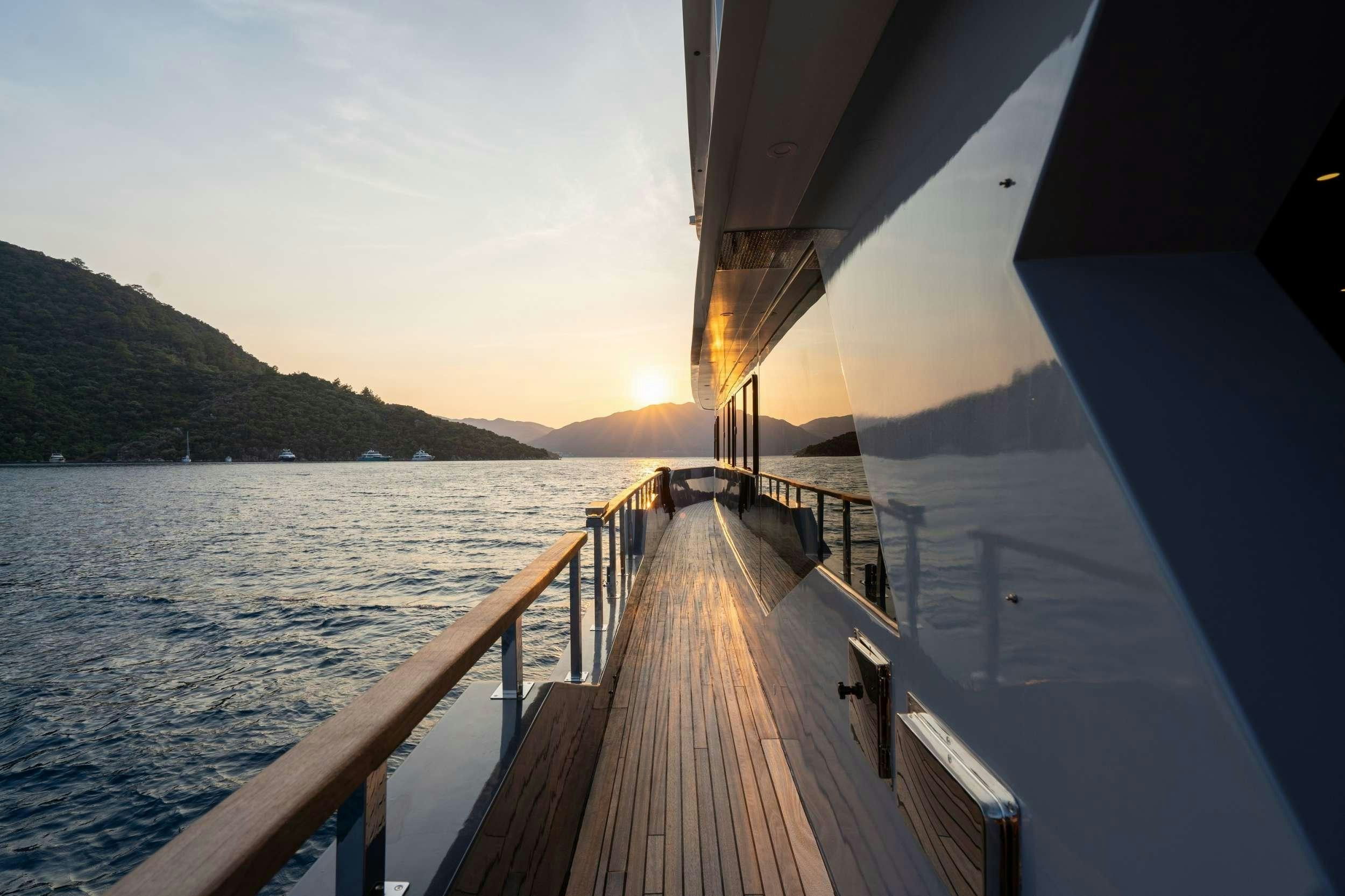 a boat on the water aboard IMPACT Yacht for Charter