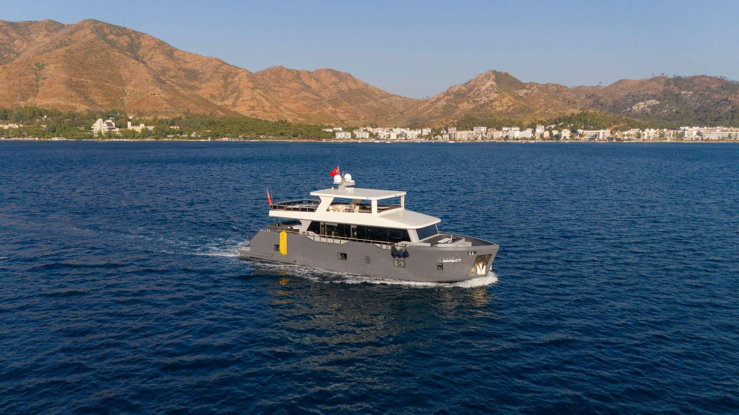 a boat in the water aboard IMPACT Yacht for Charter