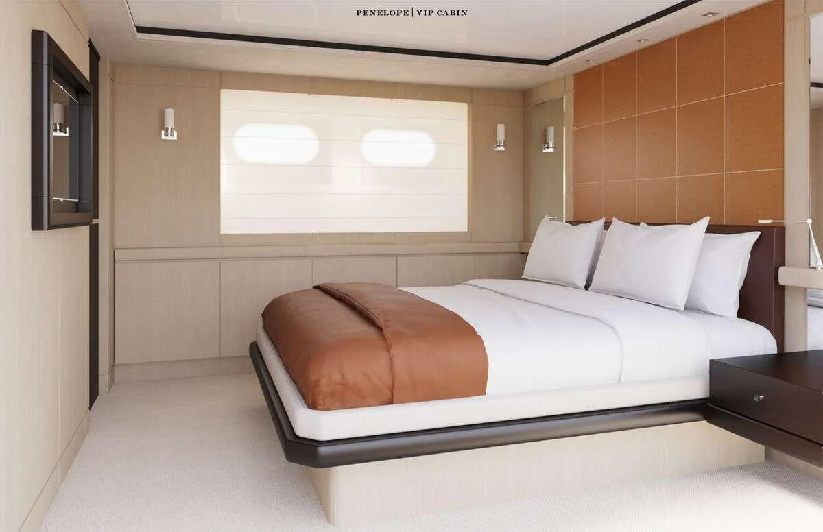 a bed with white sheets aboard PENELOPE Yacht for Charter