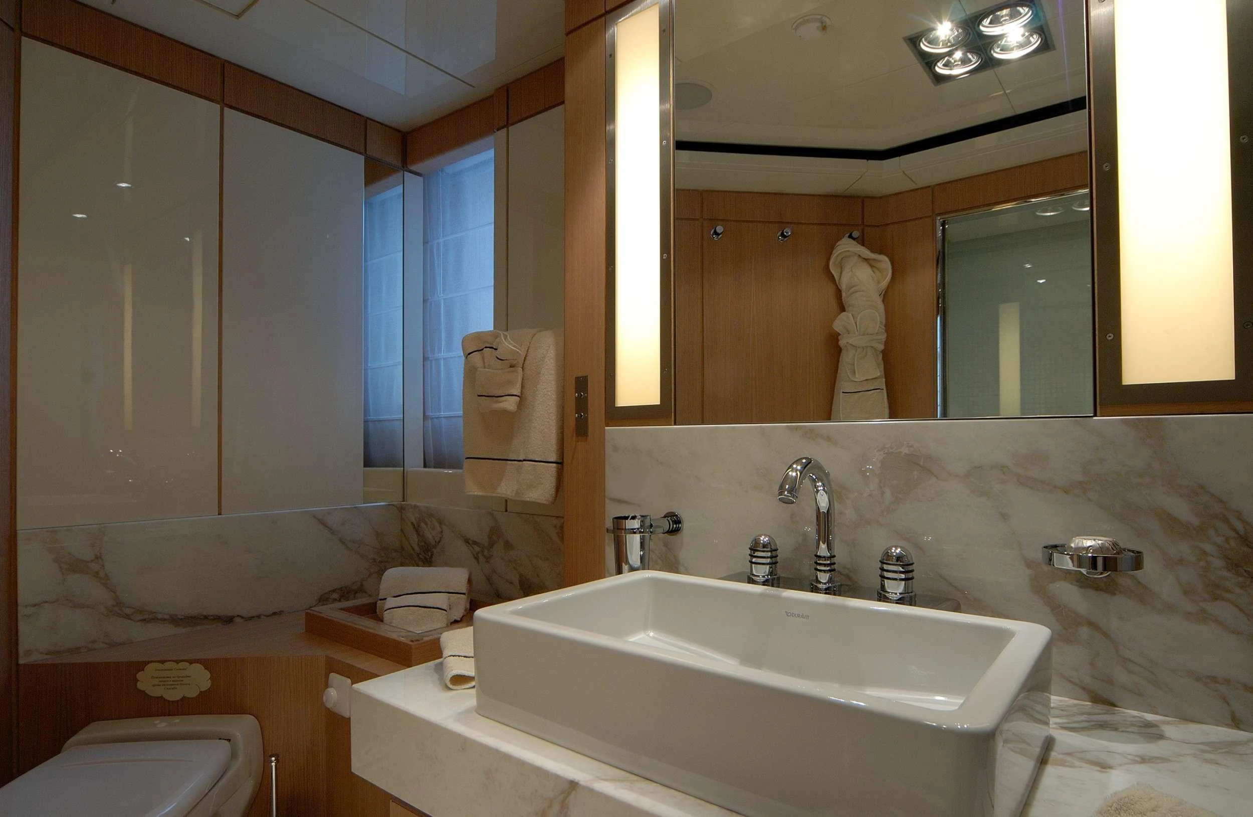 a bathroom with a large mirror aboard PENELOPE Yacht for Charter