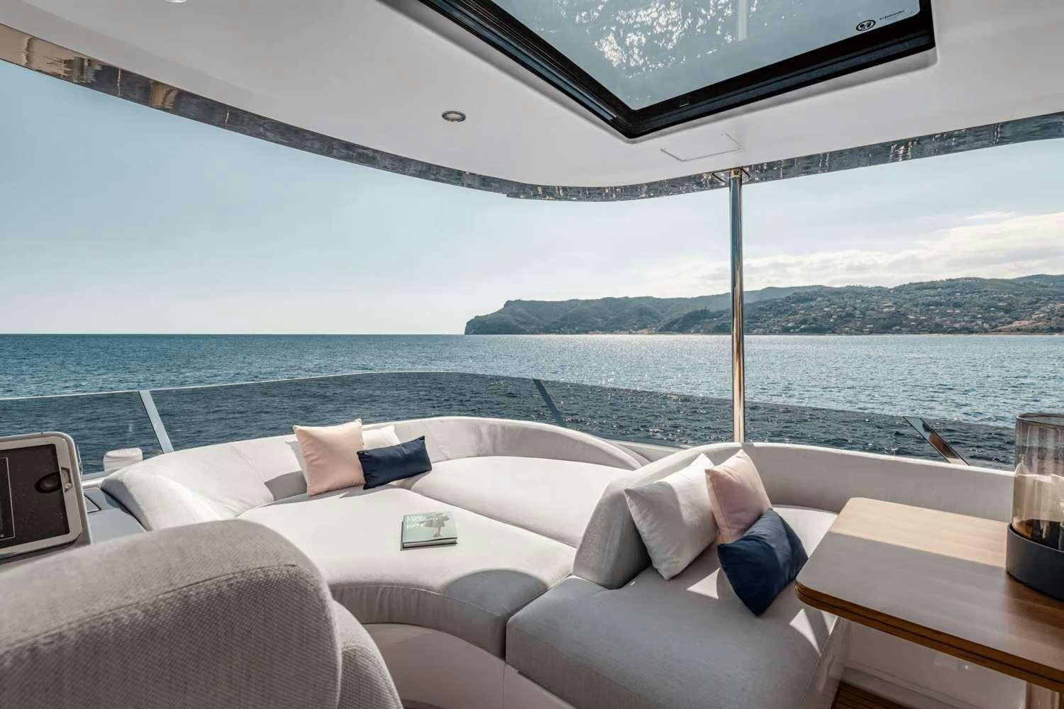 a room with a view of the ocean and mountains aboard DT78 Yacht for Charter