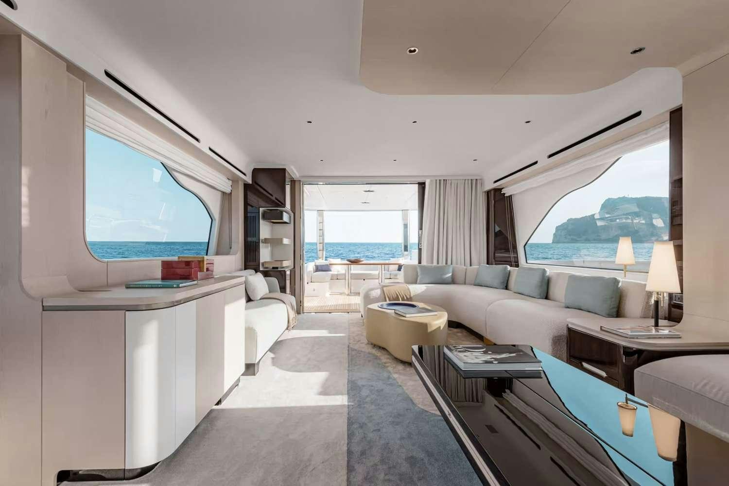a living room with a large window aboard DT78 Yacht for Charter