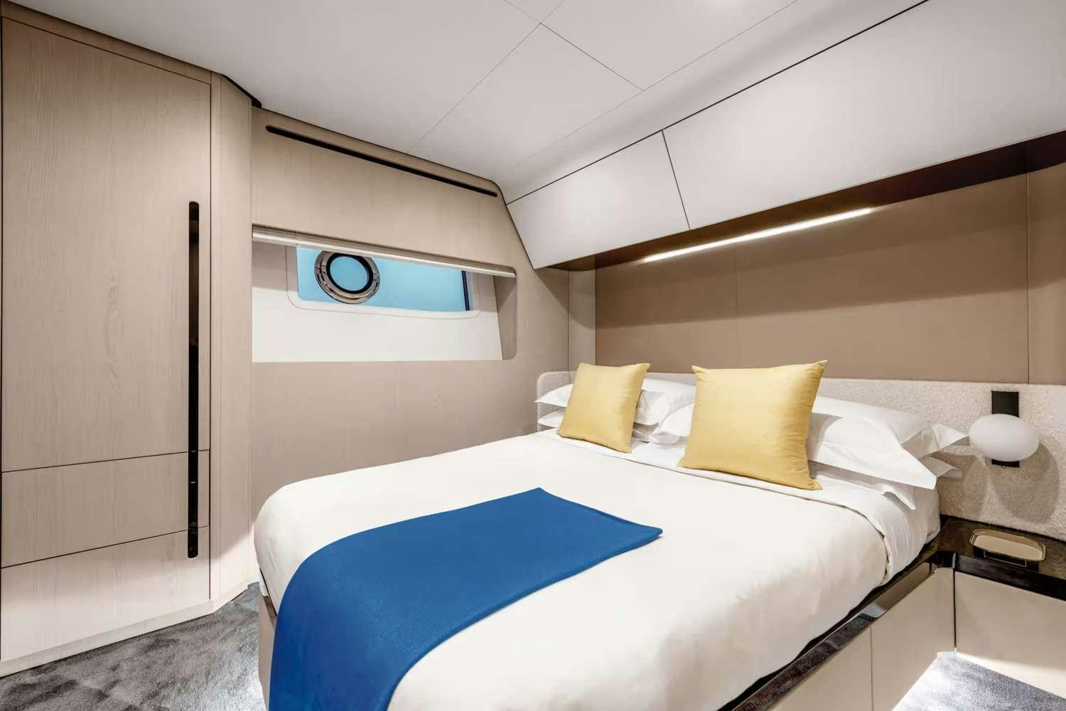 a room with two beds aboard DT78 Yacht for Charter