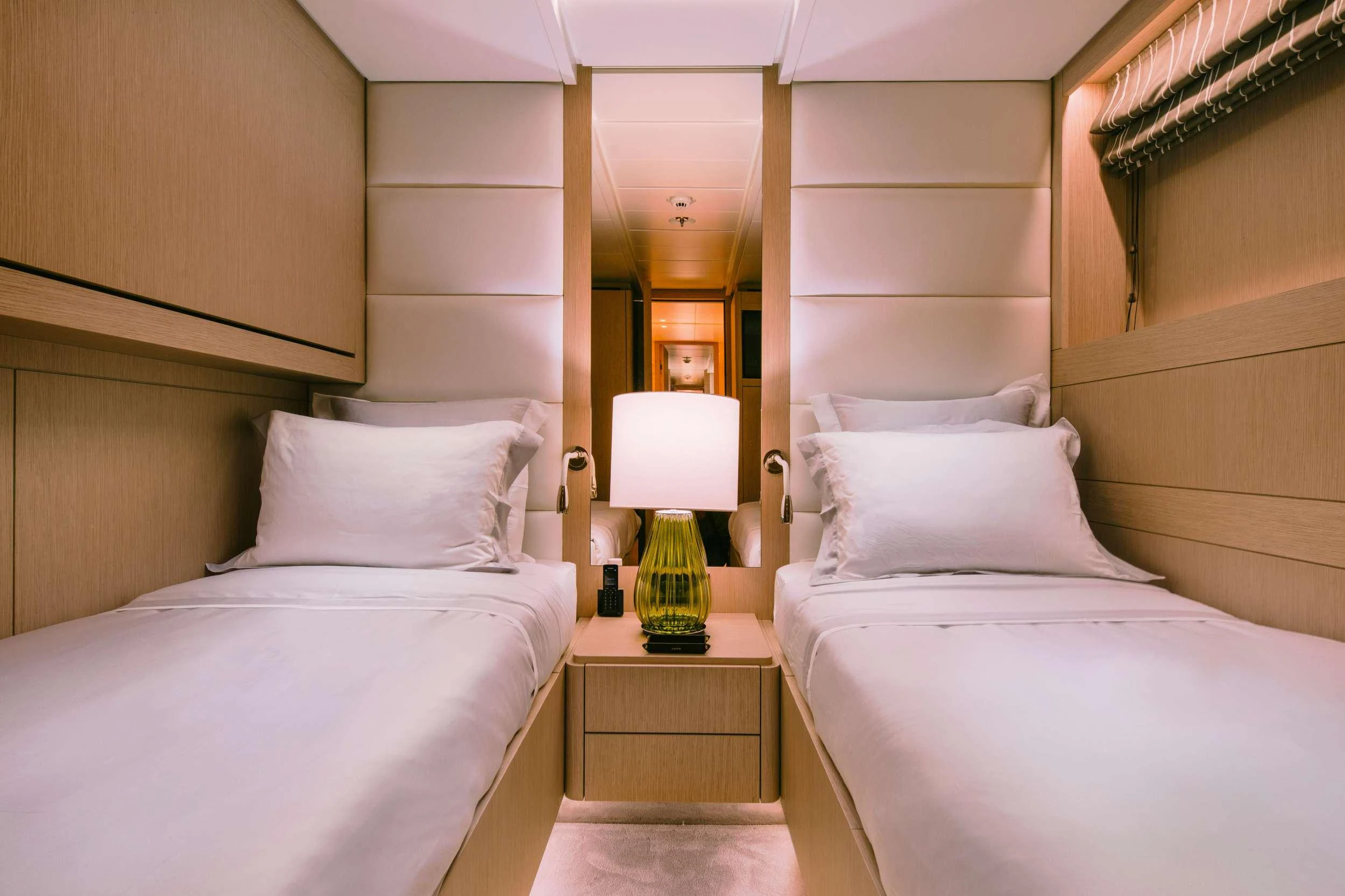 a room with two beds aboard XANA Yacht for Charter