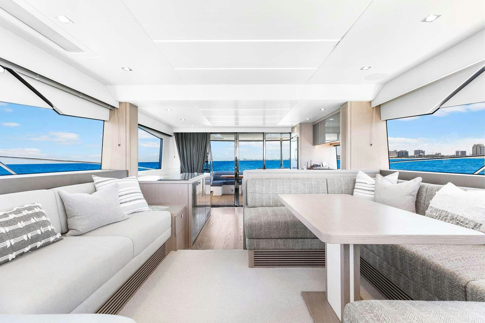a room with a view of the ocean and the ocean aboard DONE DEAL Yacht for Charter