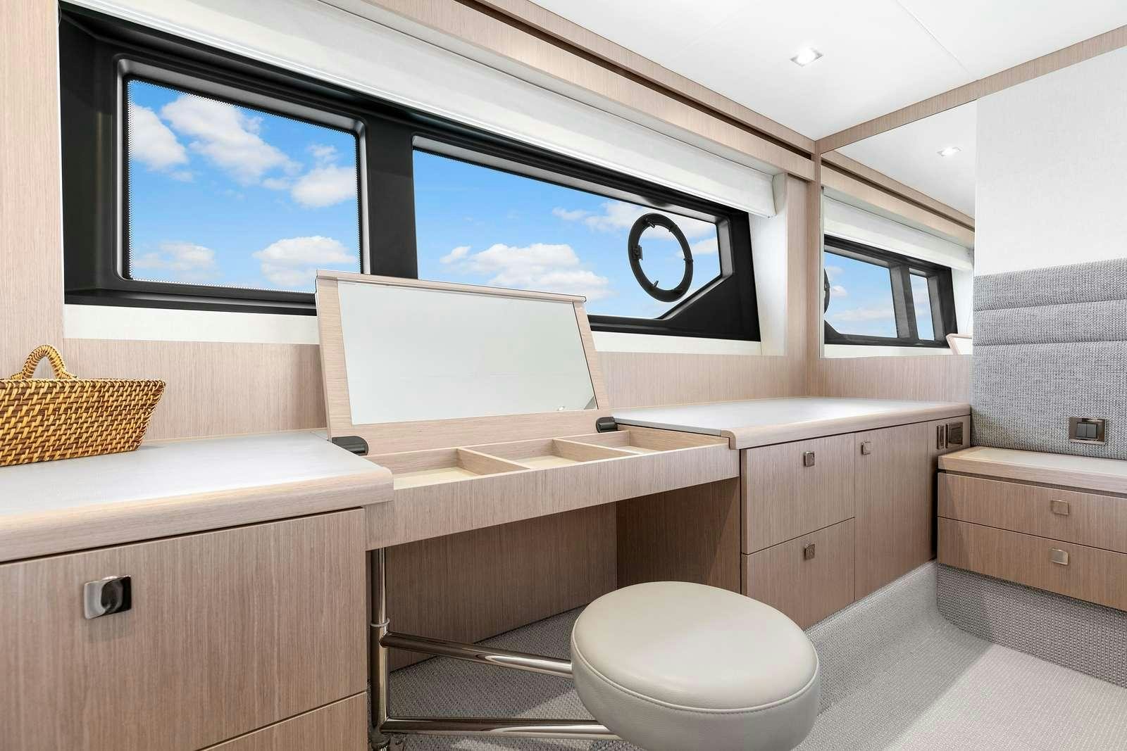 a bathroom with a large flat screen television aboard DONE DEAL Yacht for Charter