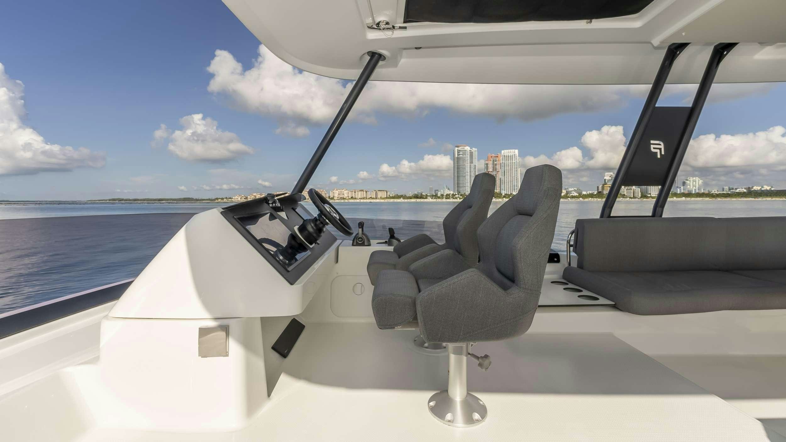 a white airplane with a large propeller aboard PRINCESS Yacht for Charter