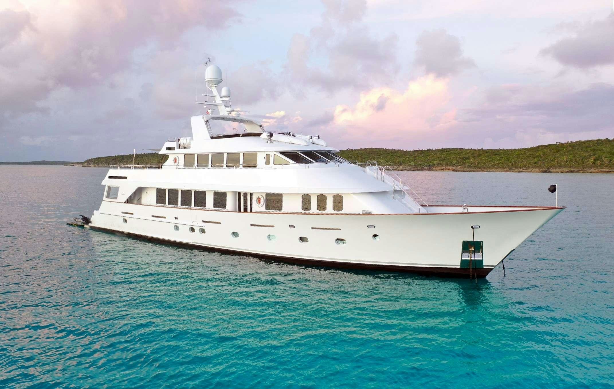 a white boat in the water aboard CHANSON Yacht for Charter