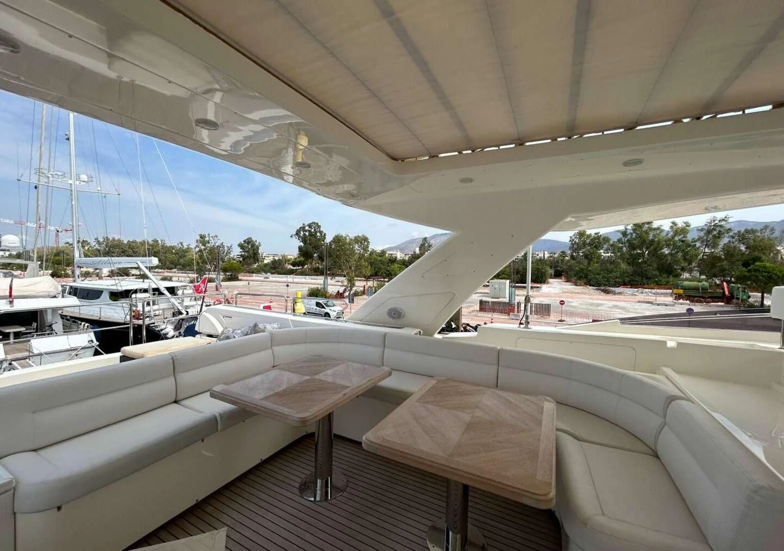 a room with a table and chairs aboard WATCH ME Yacht for Charter