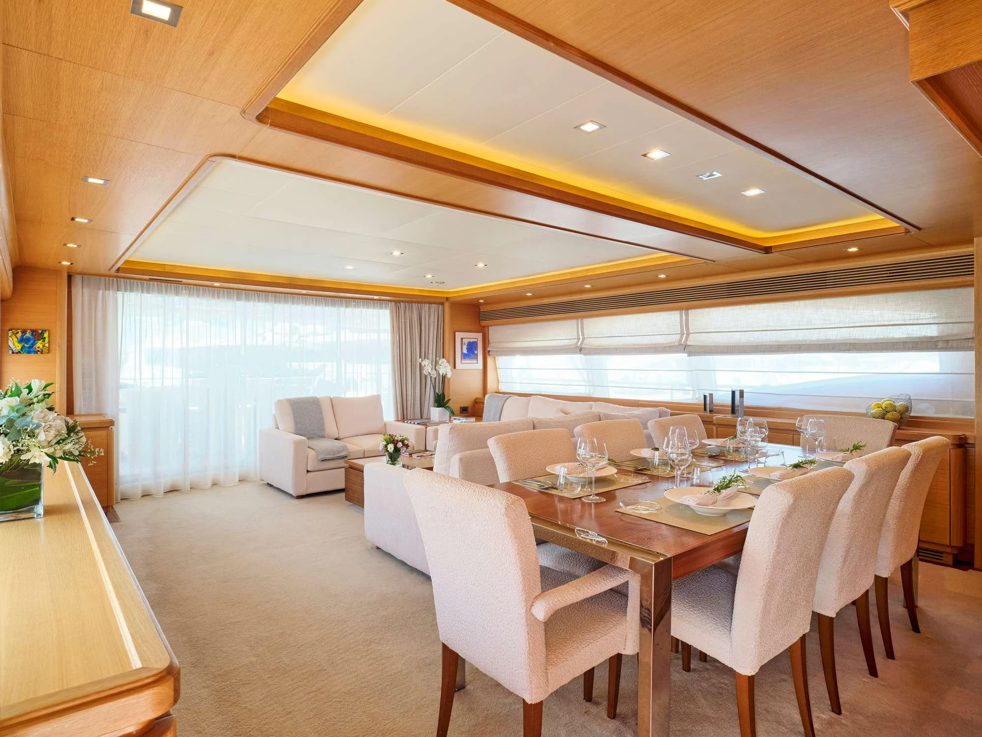 a large dining room with a large table and chairs aboard WATCH ME Yacht for Charter