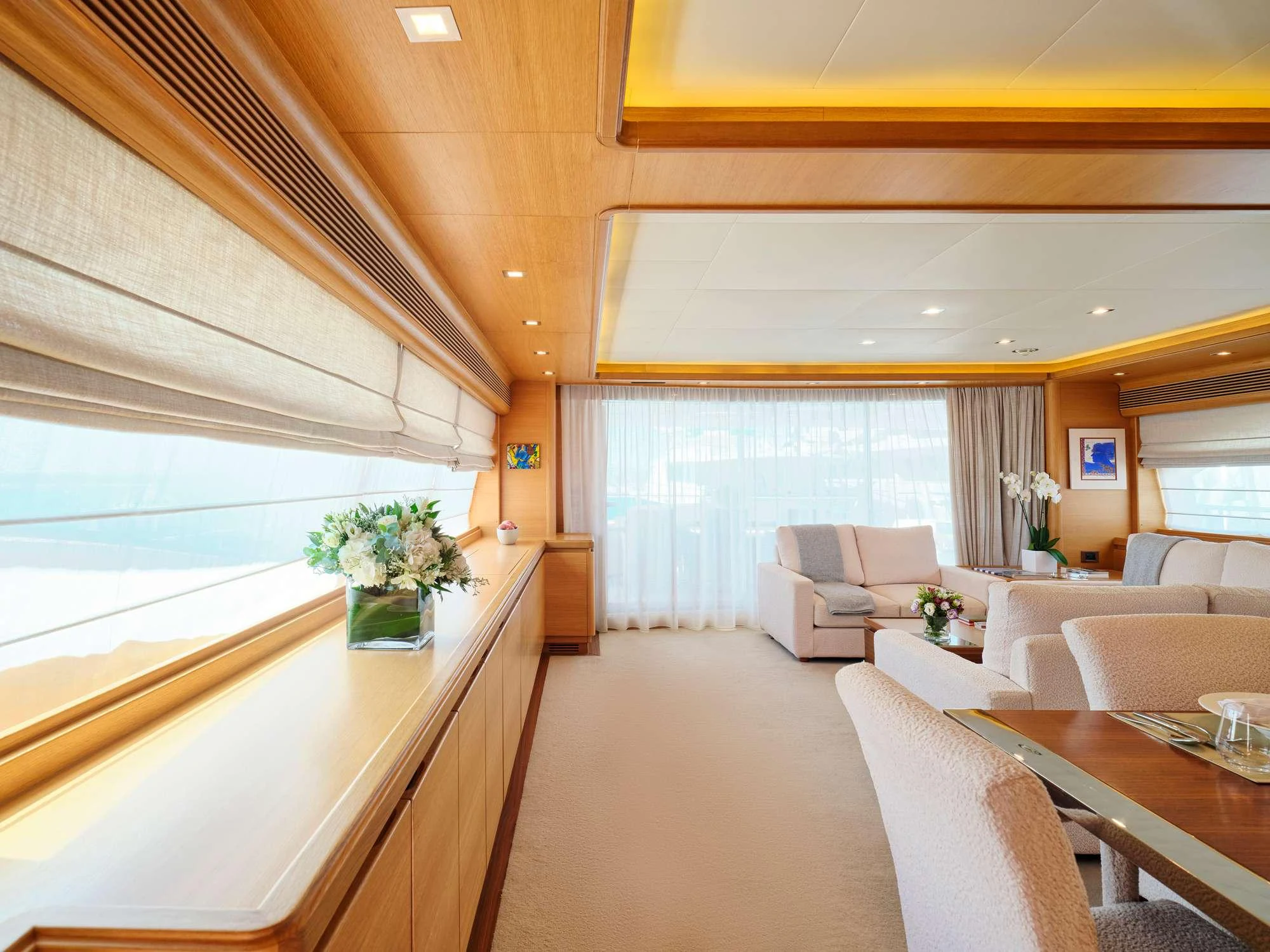 a living room with a large window aboard WATCH ME Yacht for Charter