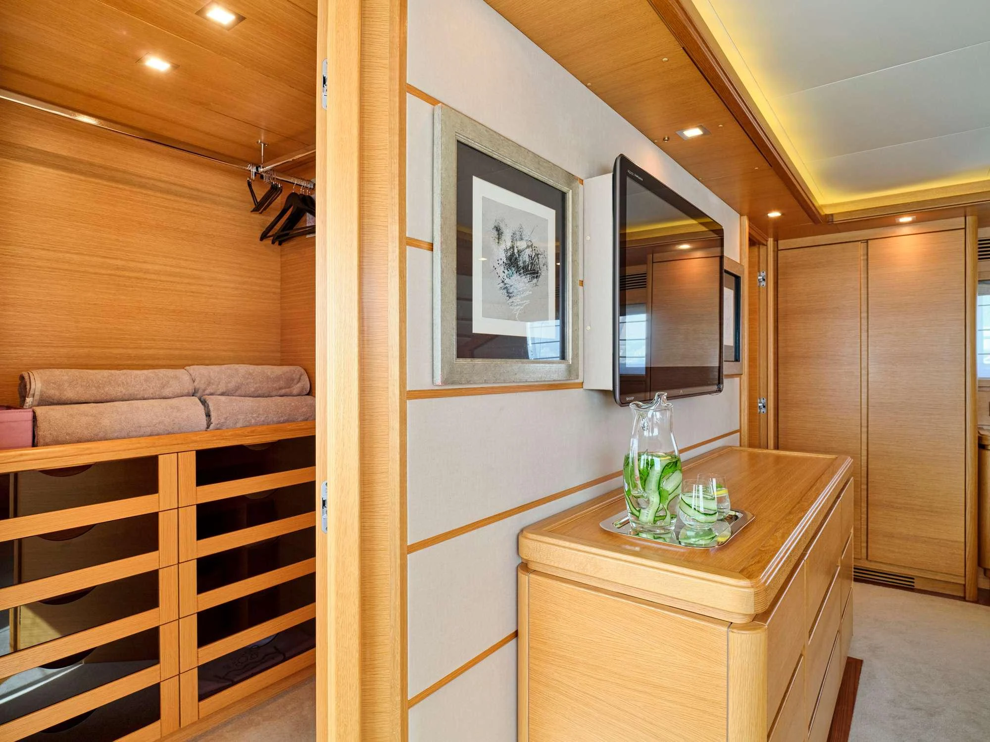 a room with a table and a couch aboard WATCH ME Yacht for Charter