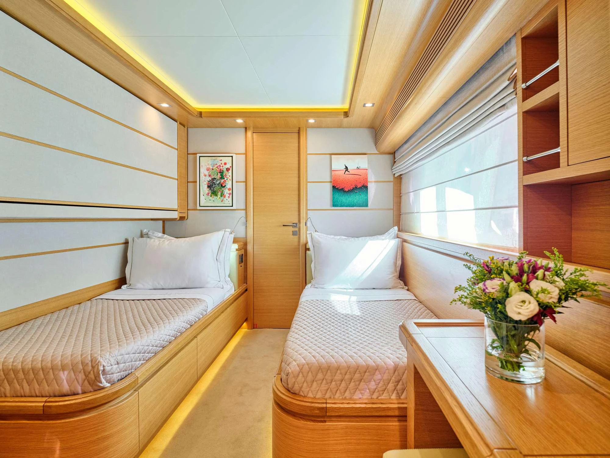 a room with a bed and a table aboard WATCH ME Yacht for Charter