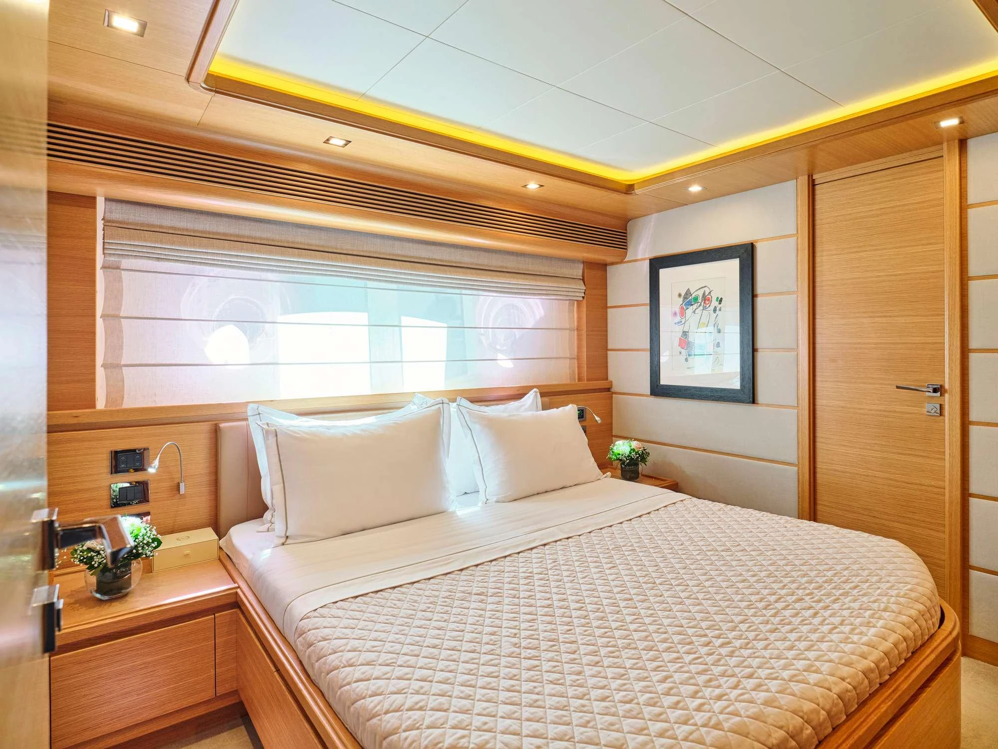 a bed with white sheets aboard WATCH ME Yacht for Charter