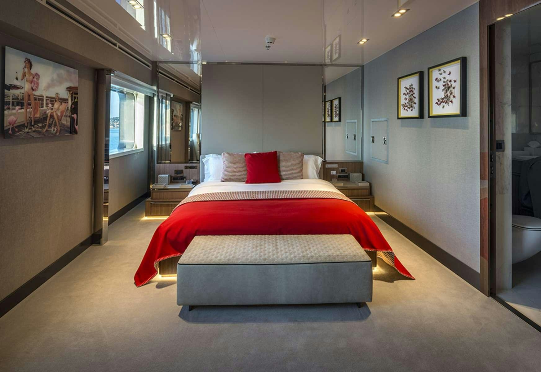 a bed in a room aboard SERENITY Yacht for Charter