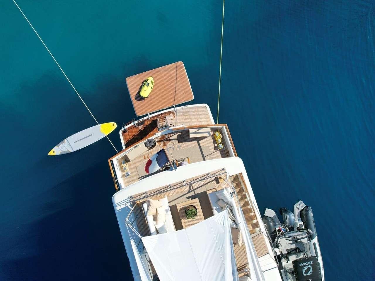 a space ship with a satellite aboard STALCA Yacht for Charter