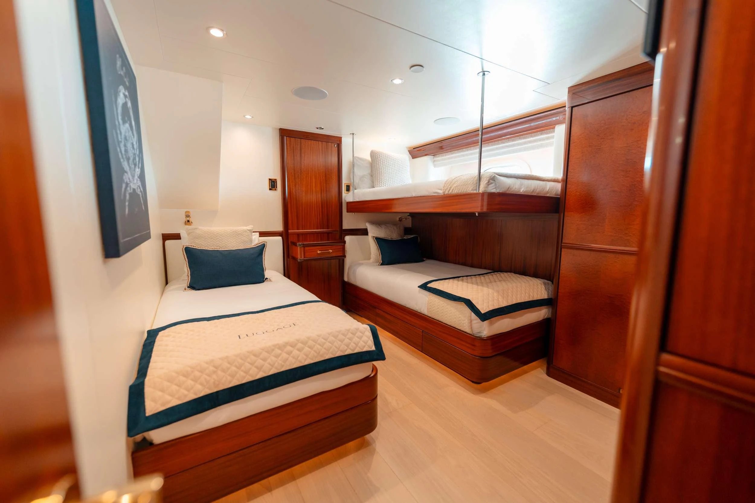a room with two beds aboard BLUE TIME Yacht for Charter