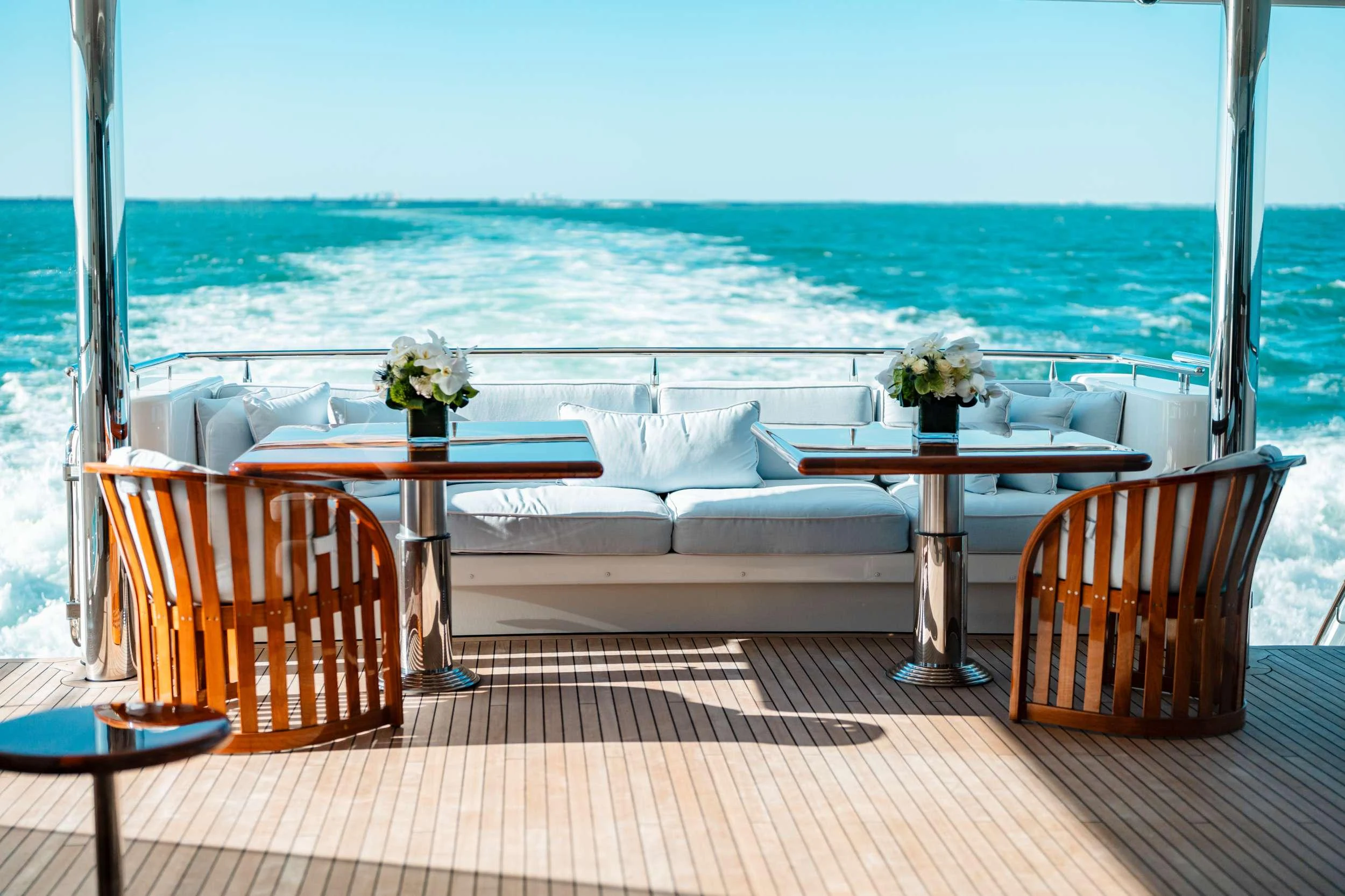 a room with a couch and table aboard BLUE TIME Yacht for Charter