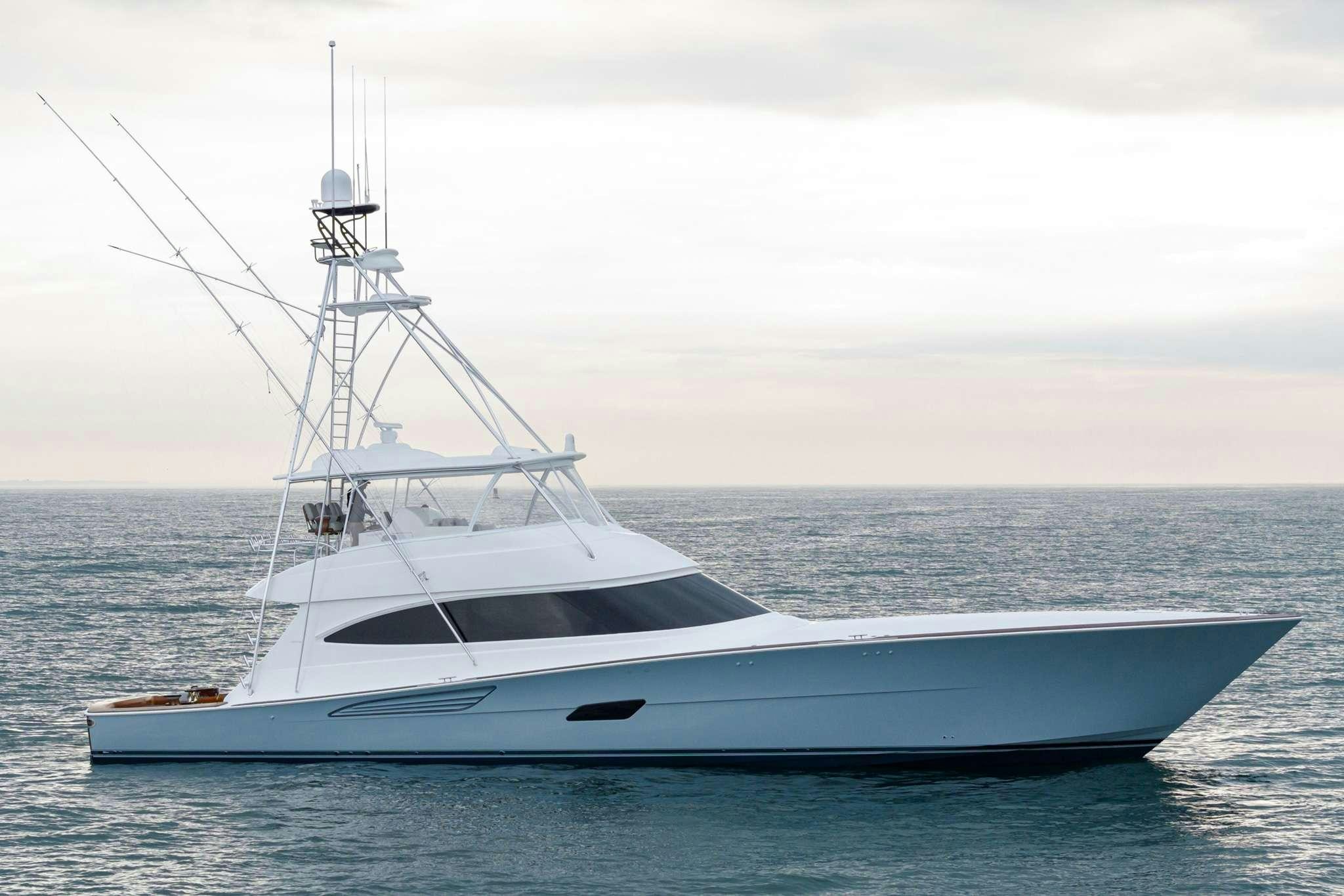 a white boat in the water aboard BOUJIE Yacht for Charter