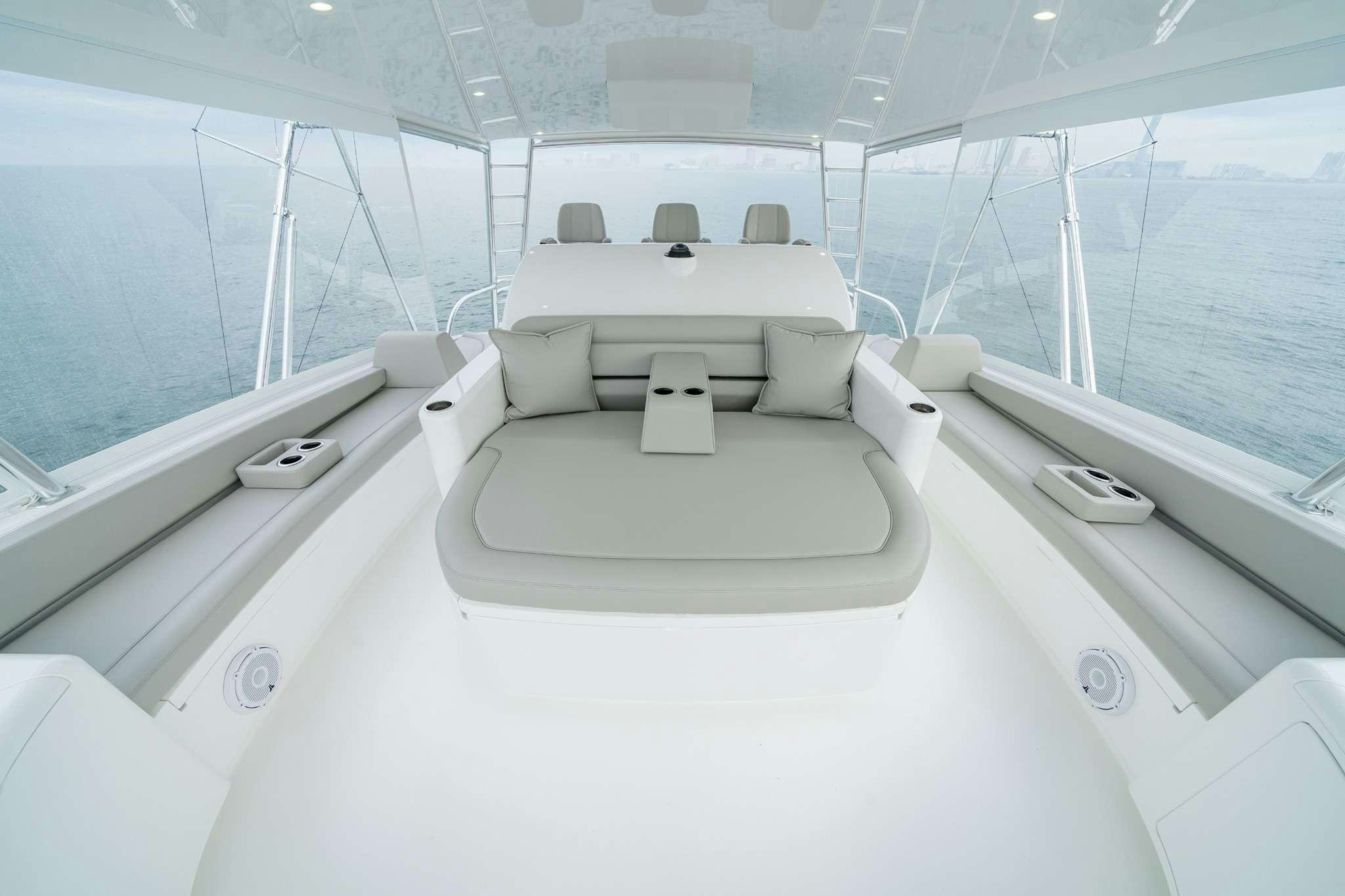 a white room with a large window aboard BOUJIE Yacht for Charter