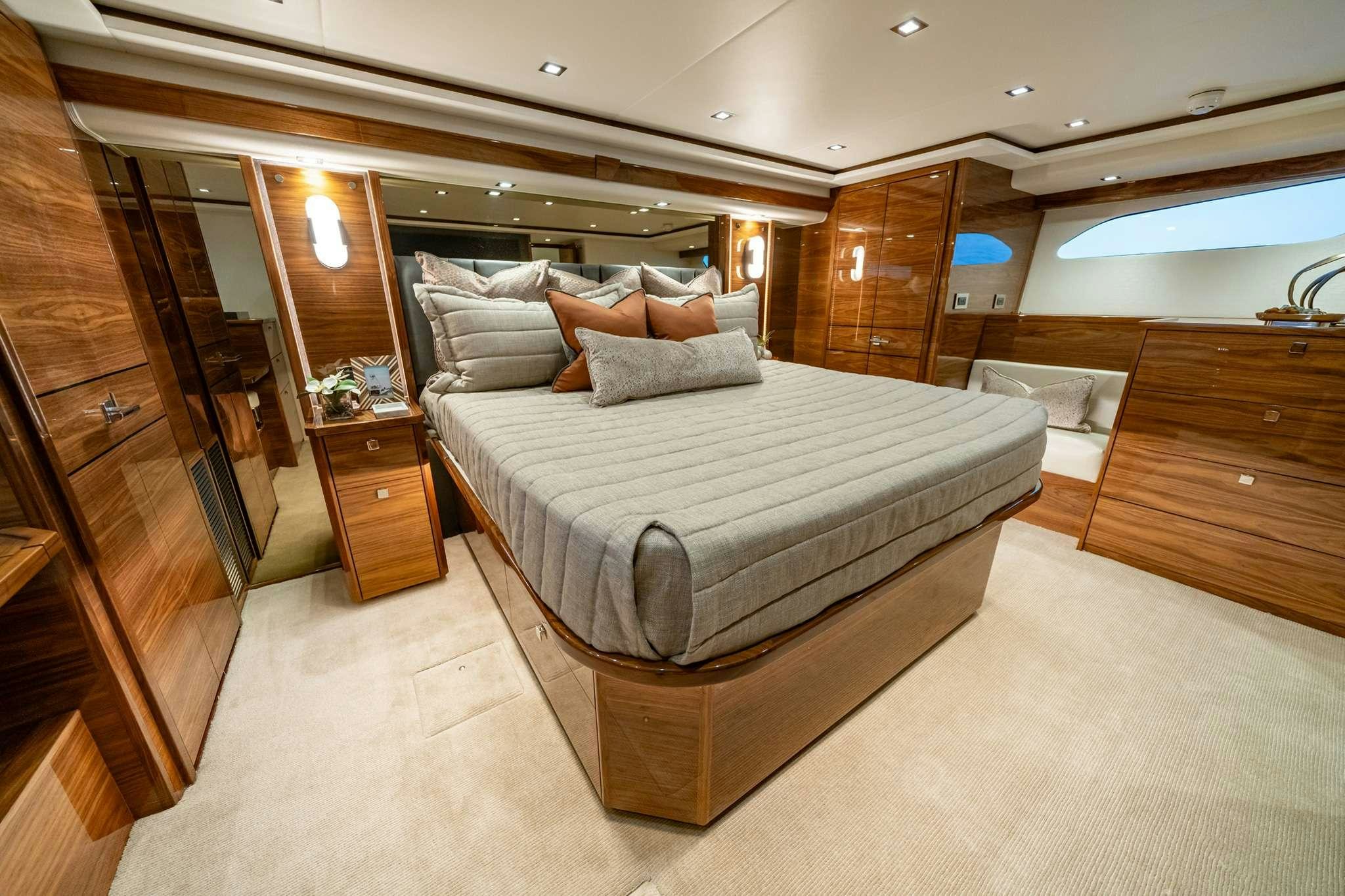 a bed in a room aboard BOUJIE Yacht for Charter