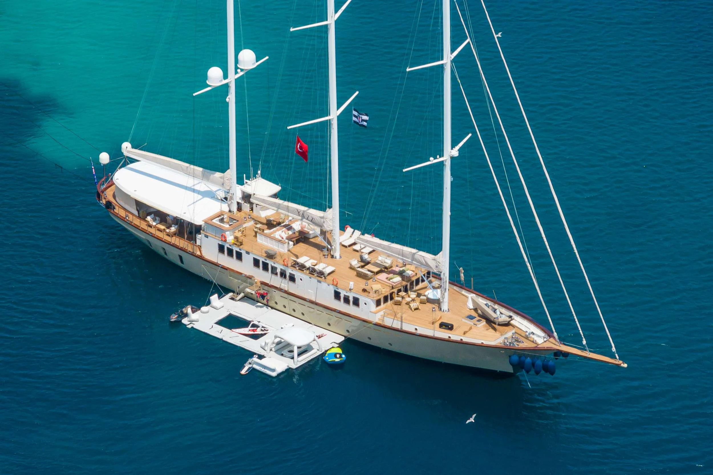 a large ship in the water aboard YAZZ Yacht for Charter