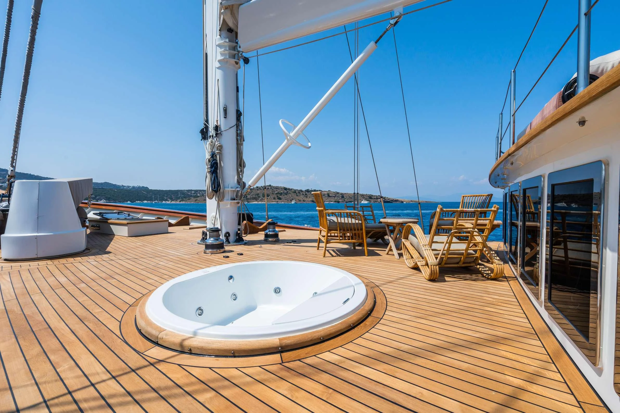 a large white tub on a deck aboard YAZZ Yacht for Charter
