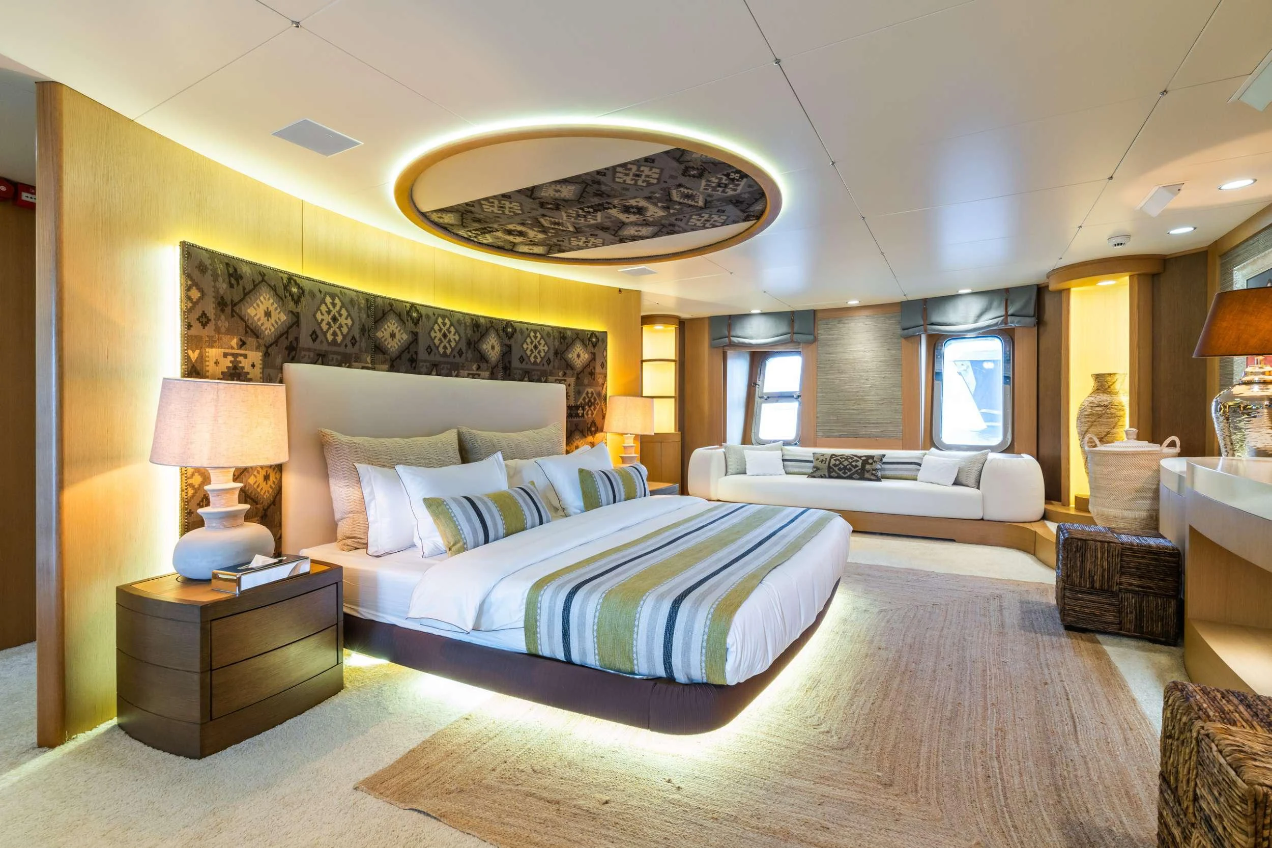 a large bedroom with a large bed aboard YAZZ Yacht for Charter
