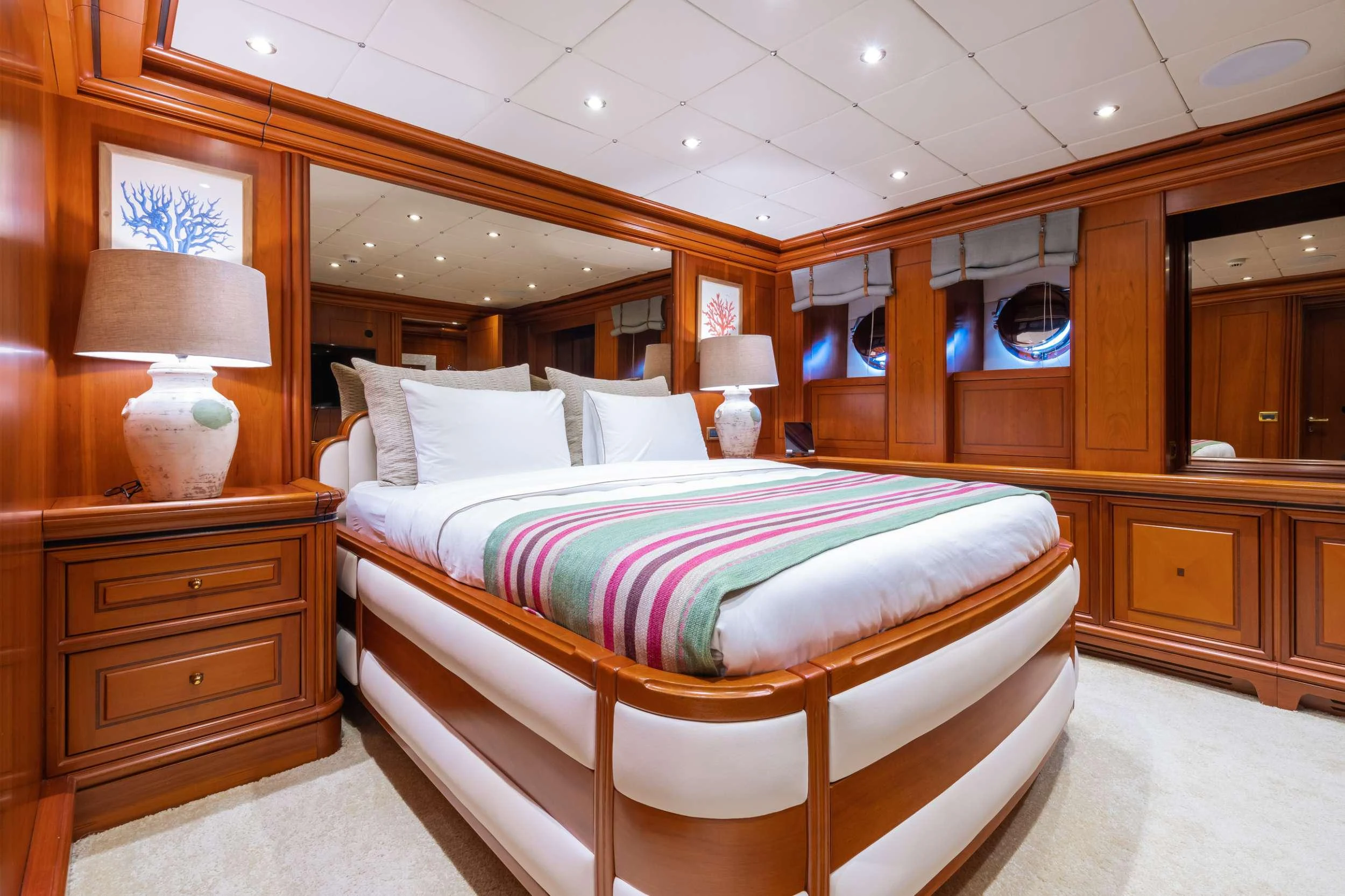 a bed in a room aboard YAZZ Yacht for Charter