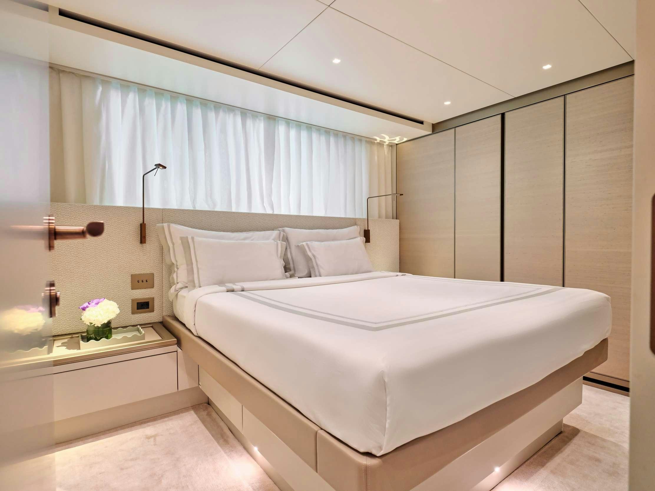 a bed in a room aboard MARY Yacht for Charter