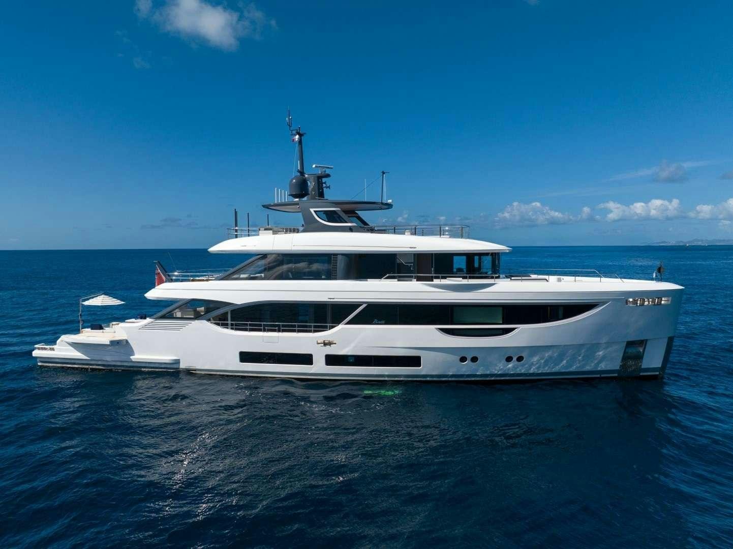 a white yacht in the water aboard KINGS LAIR Yacht for Charter