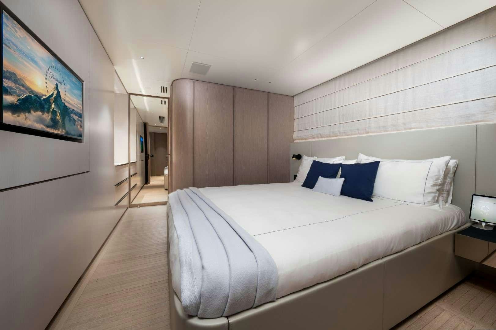 a bed in a room aboard KINGS LAIR Yacht for Charter