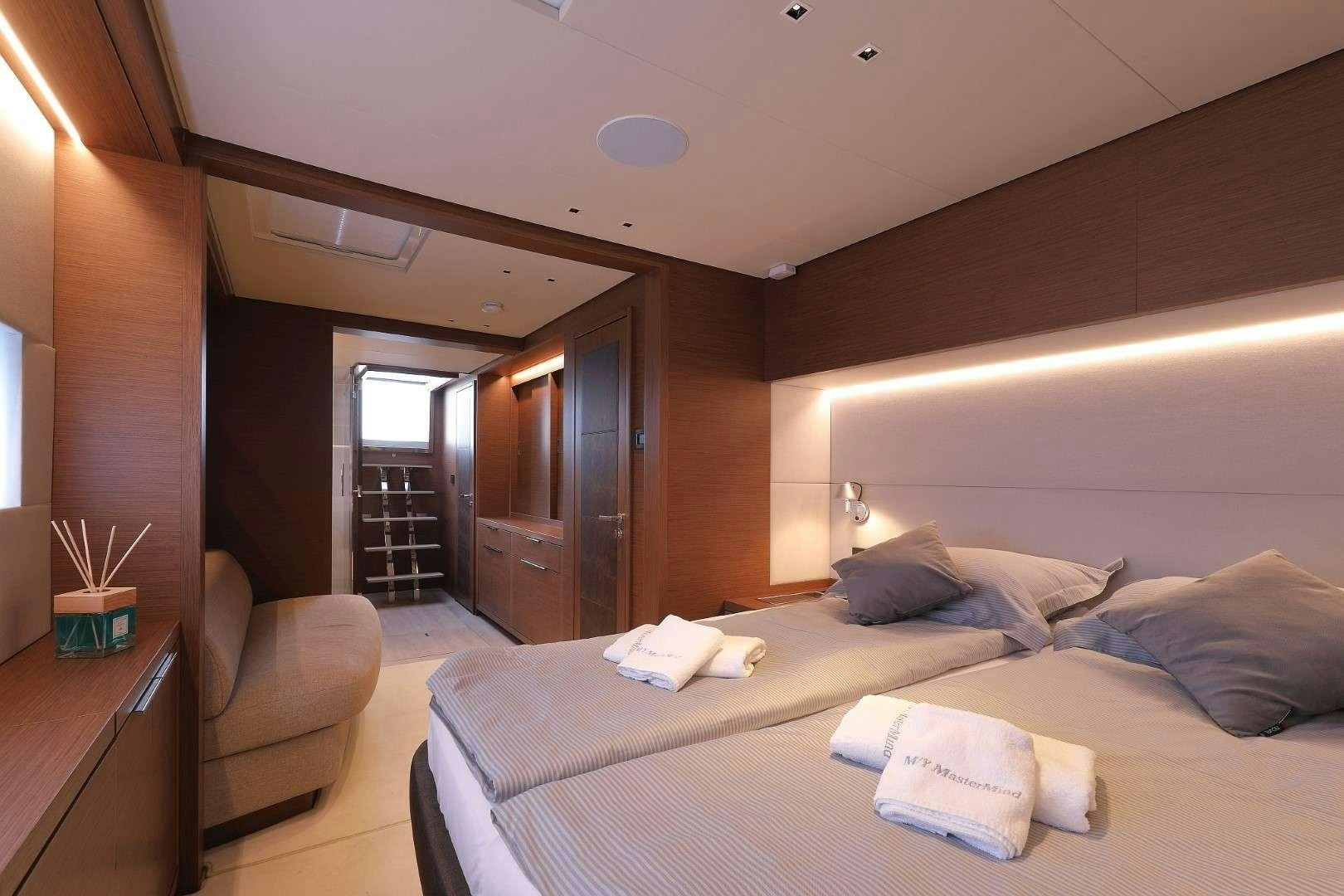 a bed in a room aboard MASTERMIND Yacht for Charter