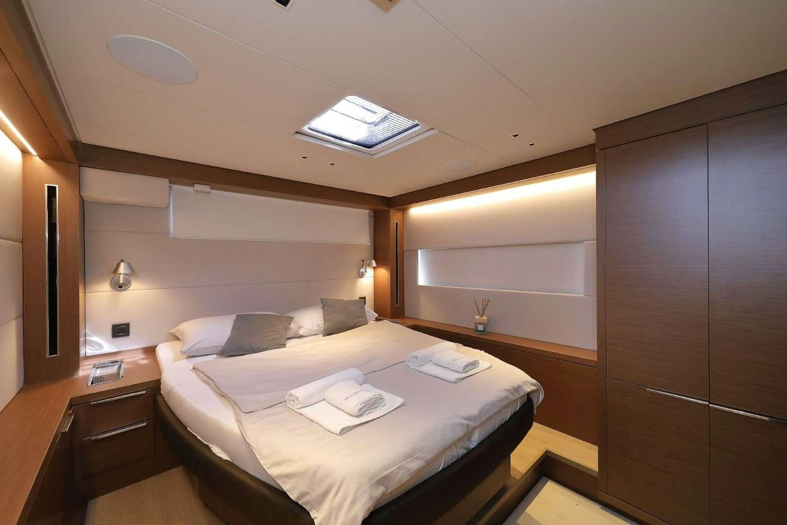 a bed in a room aboard MASTERMIND Yacht for Charter