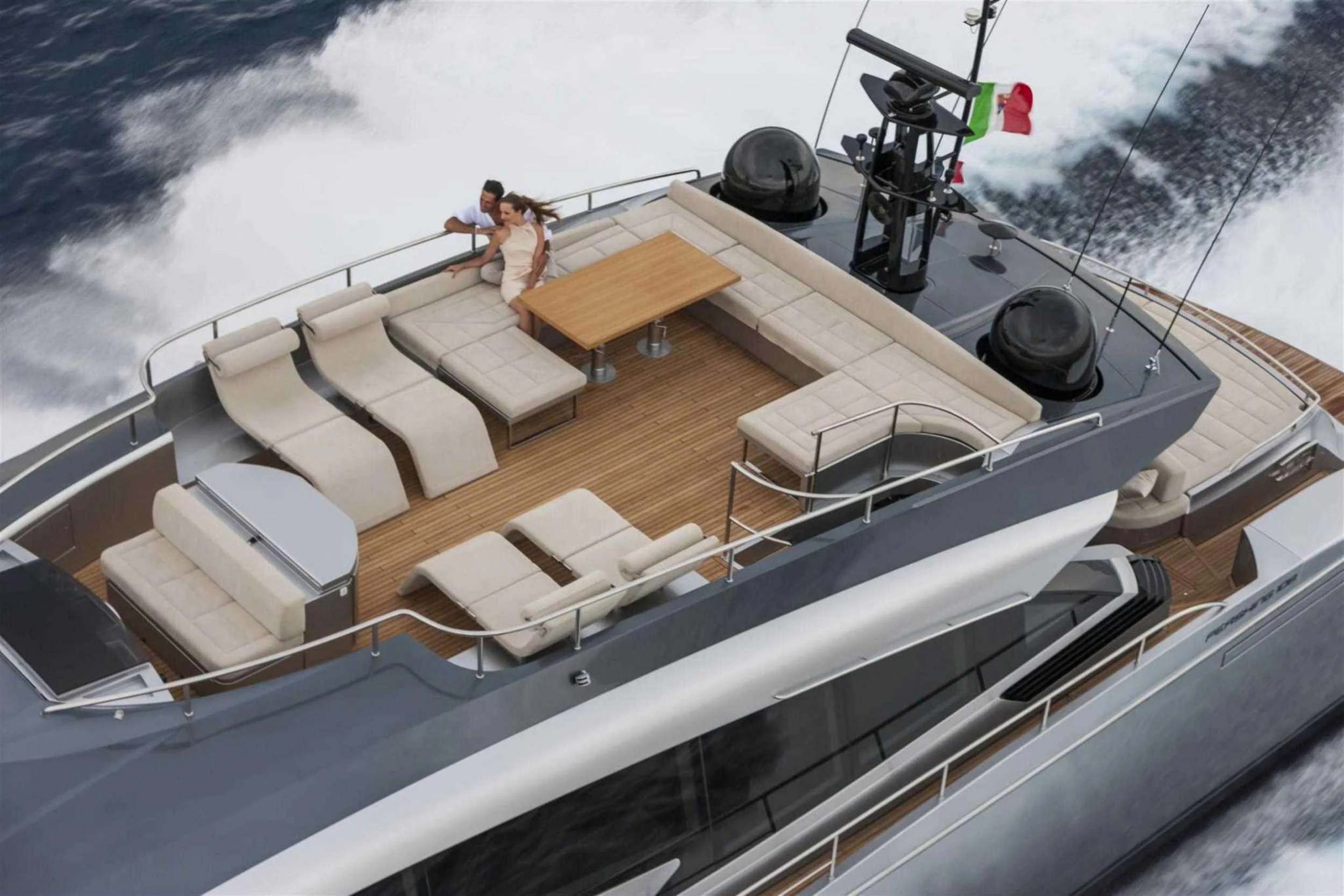 a couple of people on a boat aboard NAAV Yacht for Charter