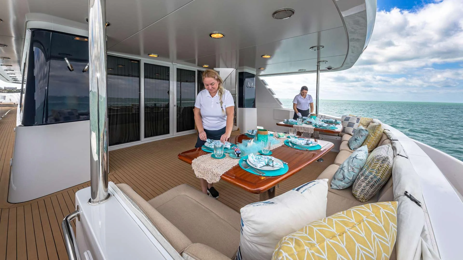 a couple of women on a boat aboard SEA DREAMS Yacht for Charter