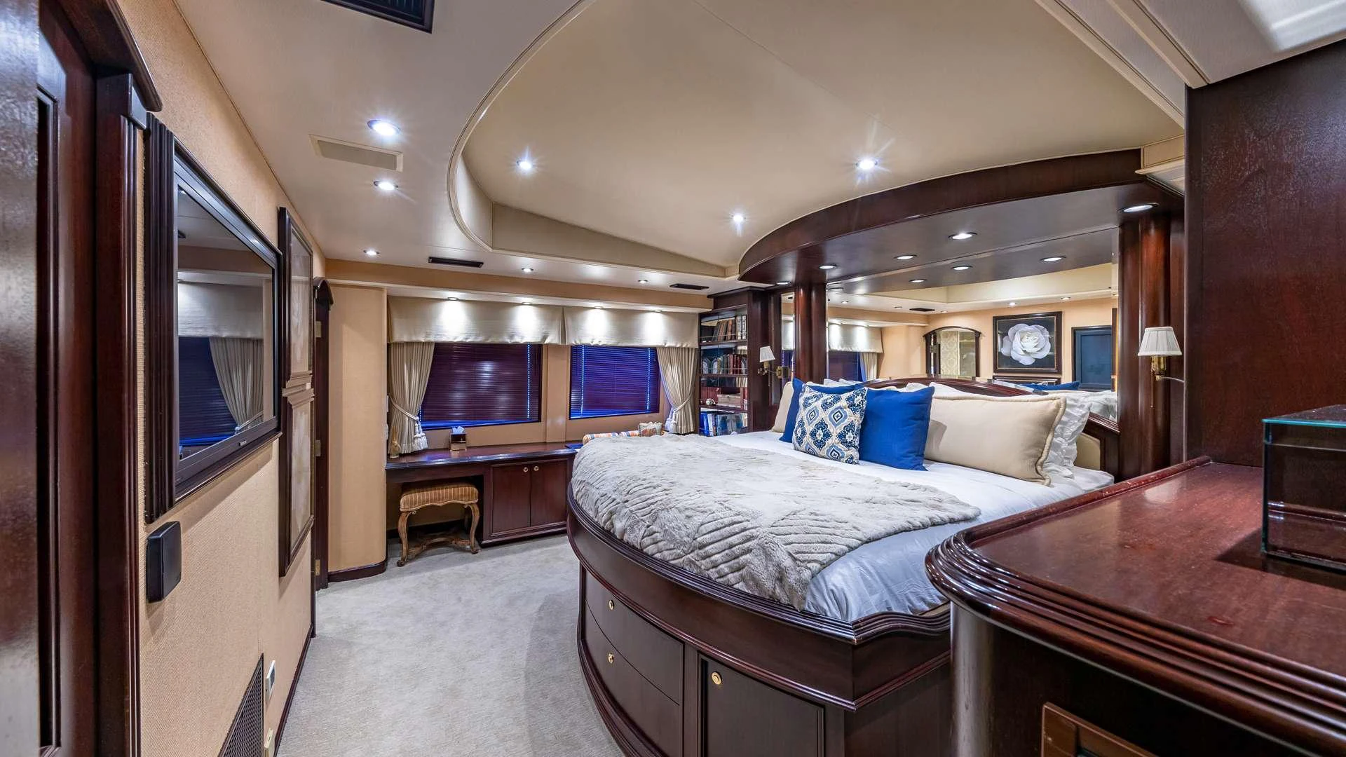 a bedroom with a large bed aboard SEA DREAMS Yacht for Charter