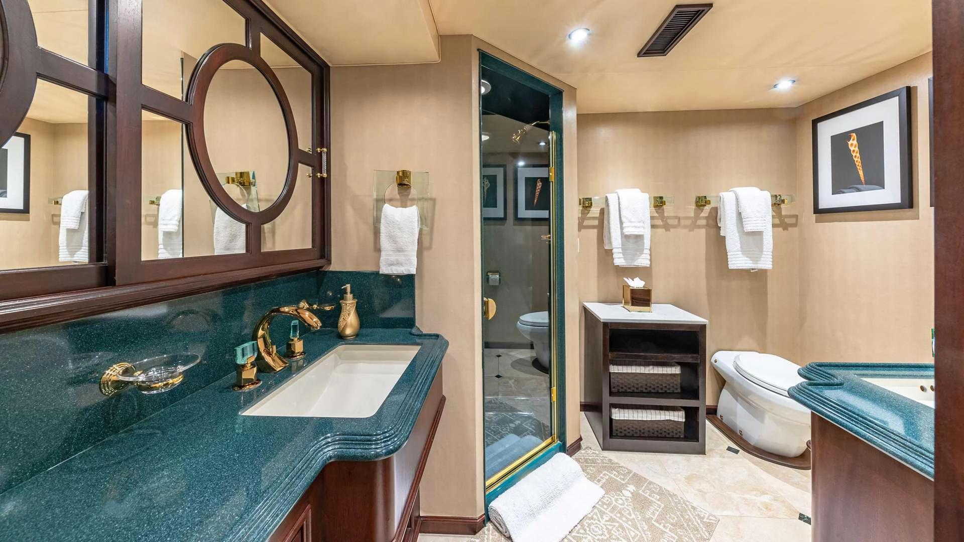 a bathroom with a blue countertop aboard SEA DREAMS Yacht for Charter