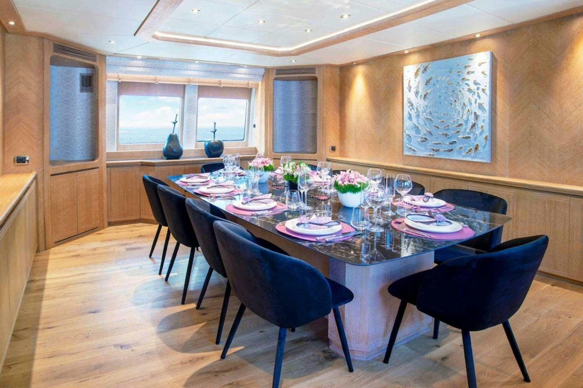 a dining table set for a meal aboard NOVA Yacht for Charter