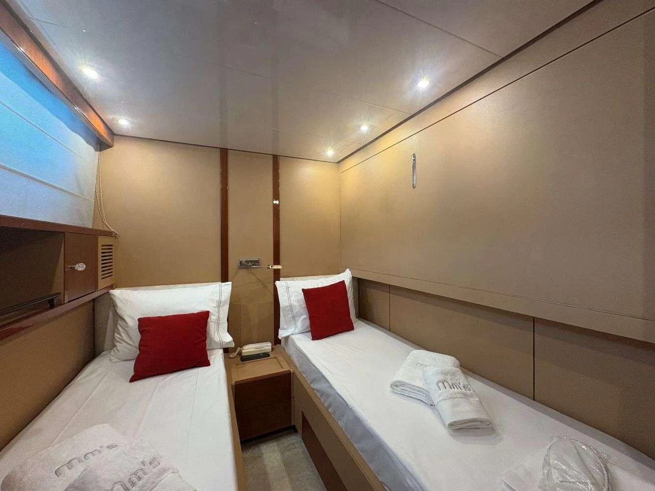 a room with two beds aboard MAMMA'S Yacht for Charter