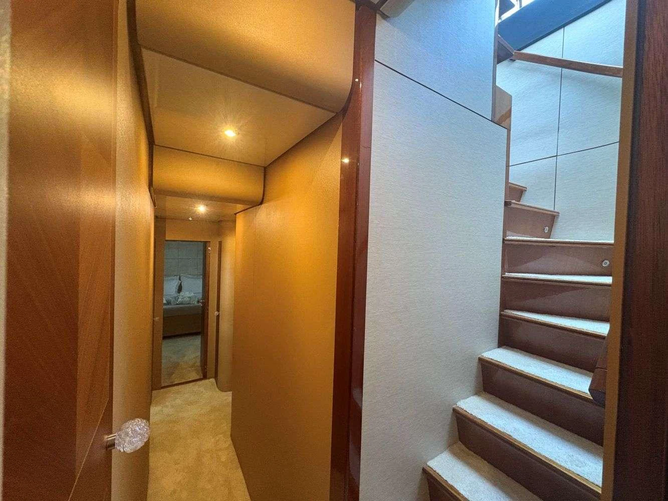 a hallway with a set of glass doors aboard MAMMA'S Yacht for Charter