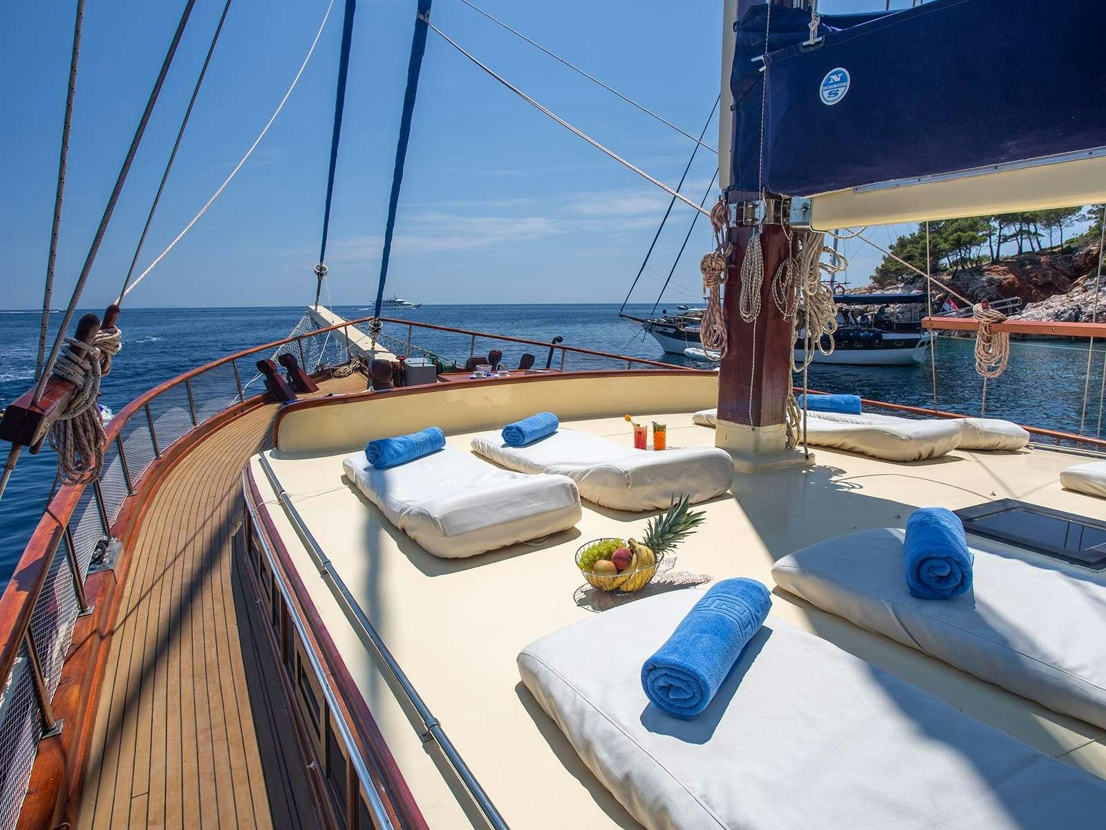 a boat with a fruit on the front aboard ELEGANZA Yacht for Charter