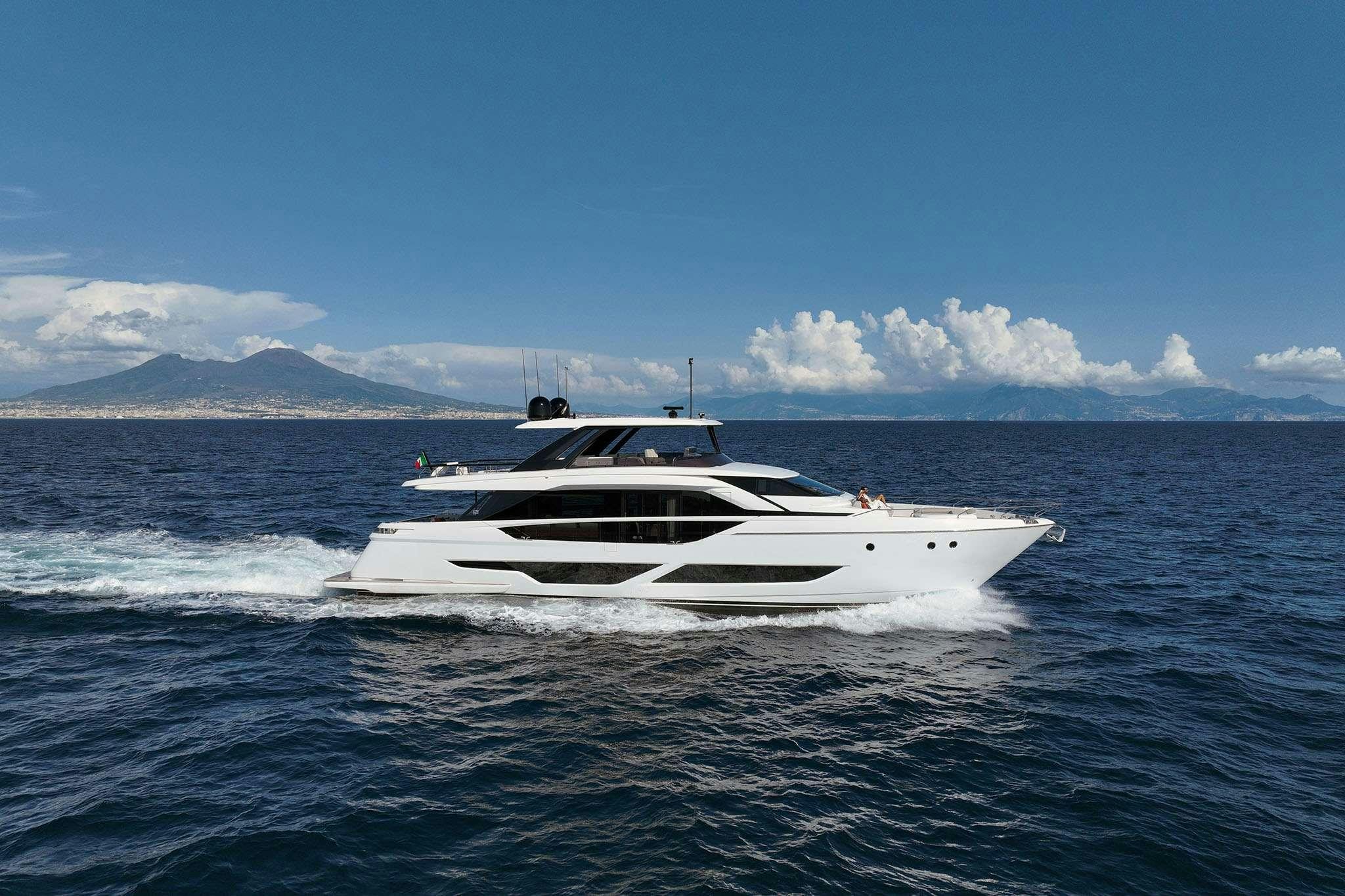 a white boat in the water aboard FAST Yacht for Charter