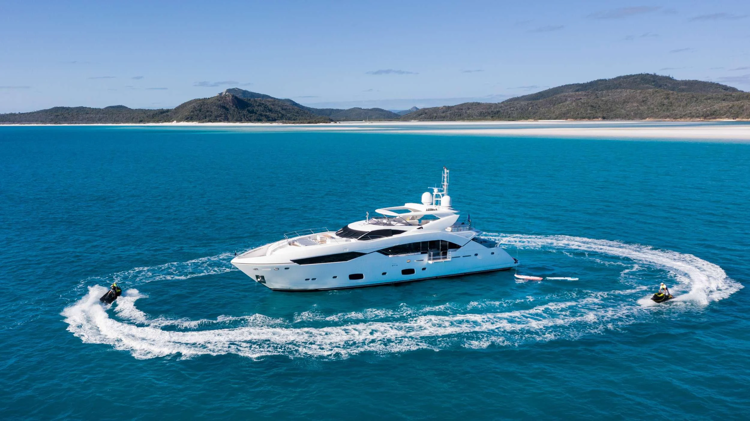 a white yacht on the water aboard GEORGE P Yacht for Charter