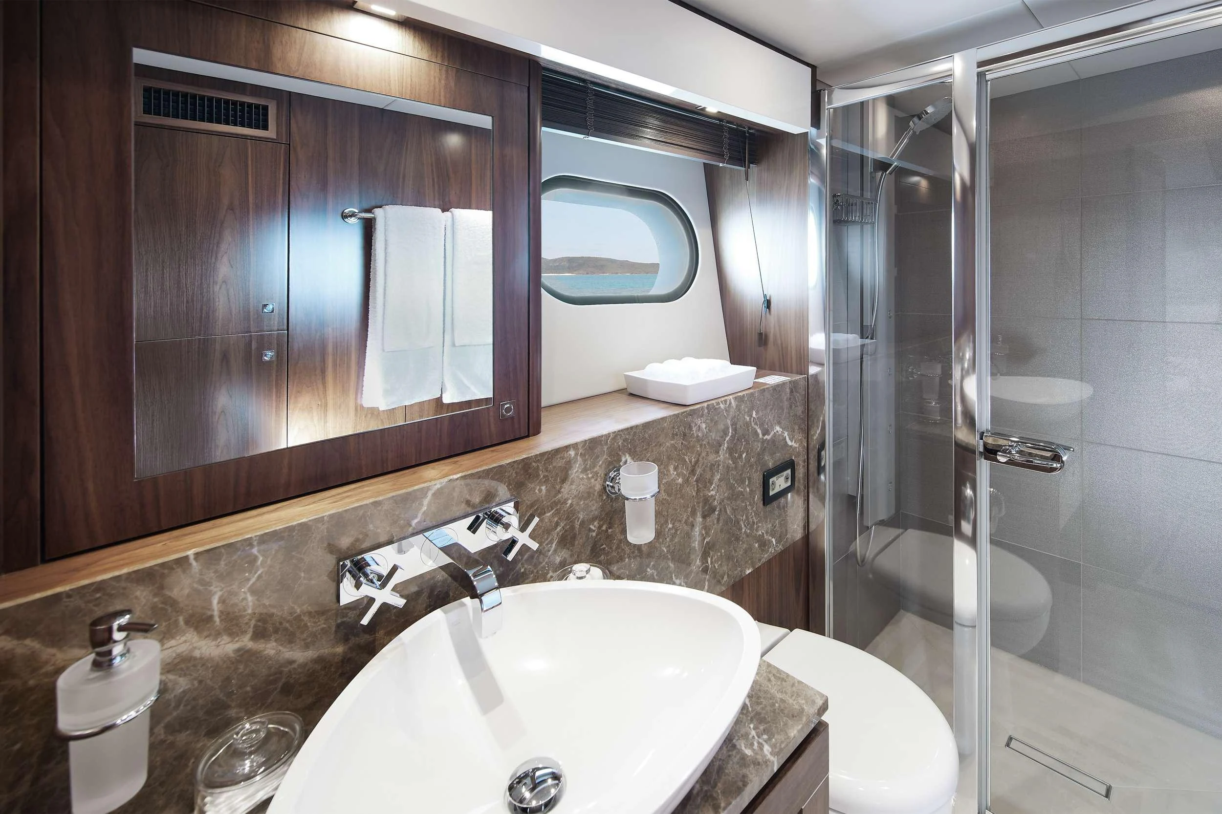 a bathroom with a sink and a shower aboard GEORGE P Yacht for Charter