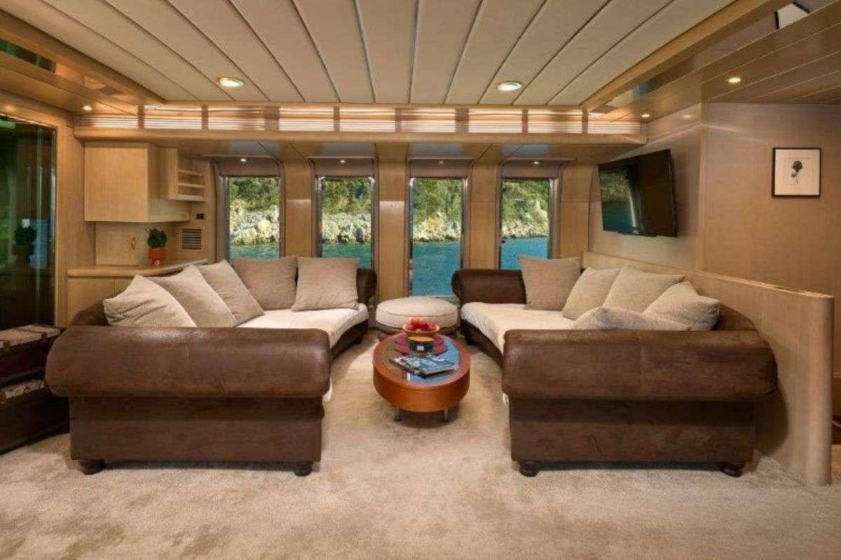 a living room with couches aboard MARSHALL Yacht for Charter