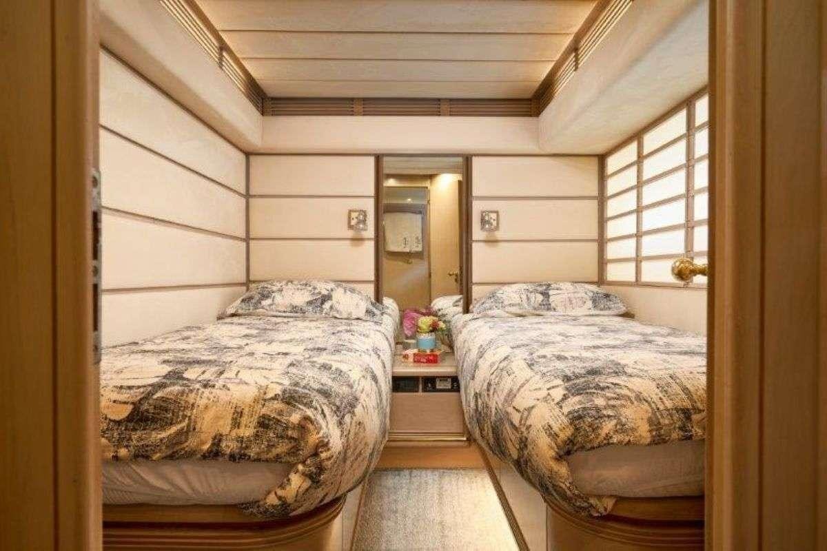 a couple of beds in a room aboard MARSHALL Yacht for Charter