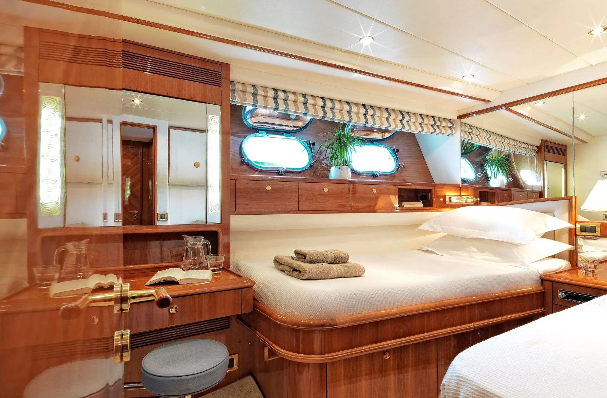 a bathroom with a large mirror aboard ATALANTI Yacht for Charter